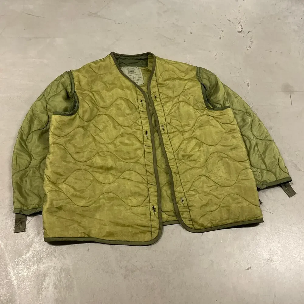 vintage men’s 90s green textured military liner quilted jacket